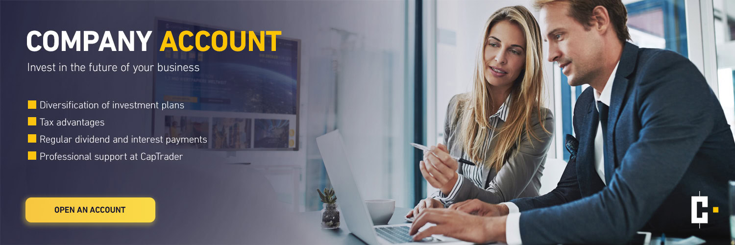 Two professionals are sitting at a desk using a computer. On the left-hand side, a text advertises corporate accounts with benefits and an "Open account" button.